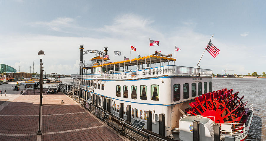 Warehouse District, Riverwalk, the Creole Queen, an authentic paddlewheeler boat, and the Mississippi river Photograph by Massimo Borchi/Atlantide Phototravel