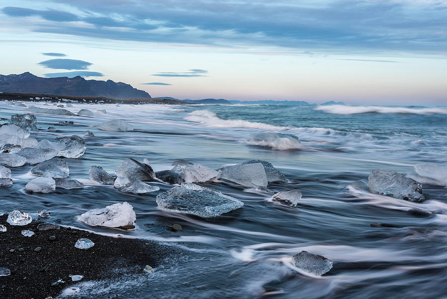 Washed up Ice Sunset 3 Photograph by Scott Cunningham