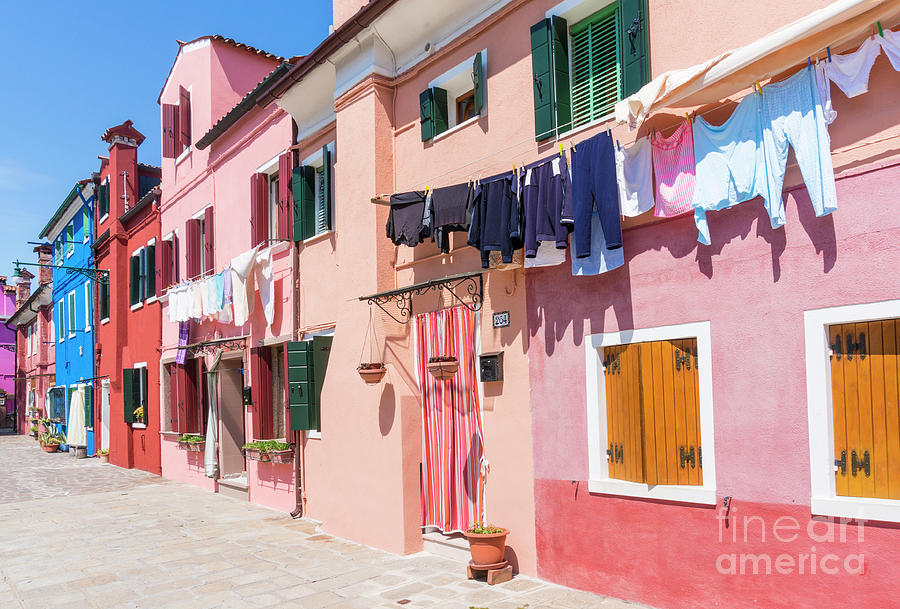 Italy Photograph - Washing drying outside coloured houses on the island of Burano in the Venice lagoon, Venice, Italy by Neale And Judith Clark