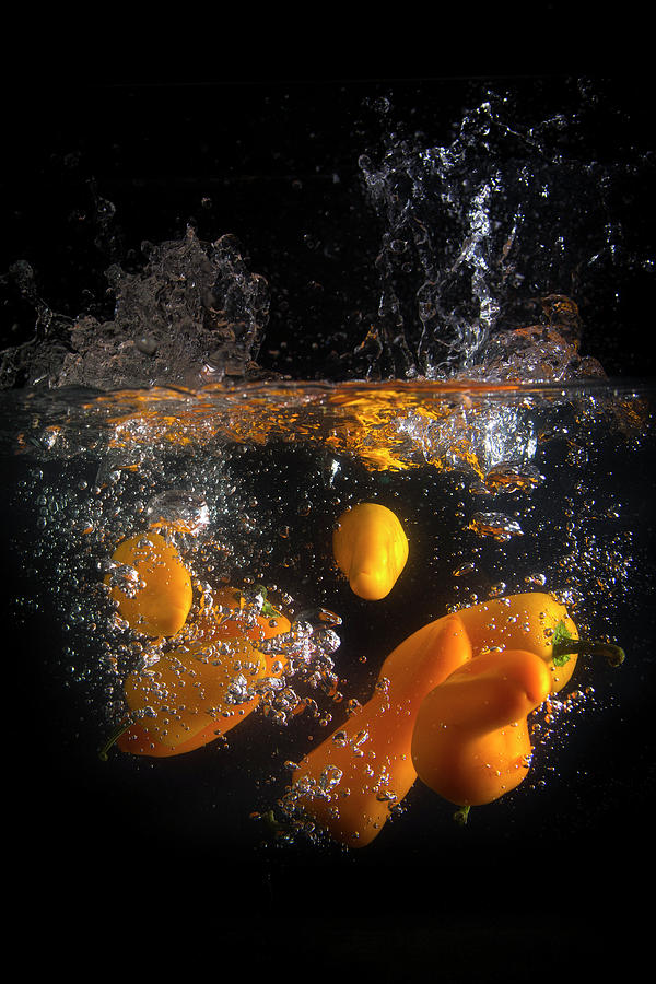 Washing Peppers Photograph by Bill Cubitt