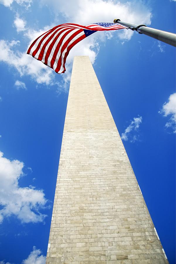 Washington Monument and American flag Photograph by Juan Camilo Bernal