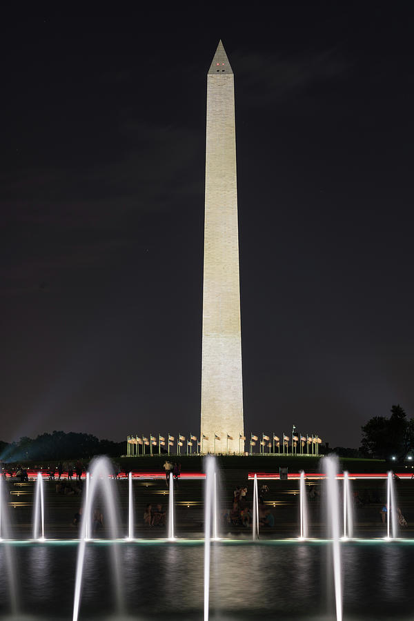 Washington Monument over the fountains at World War Two memorial in DC Photograph by Steven Heap