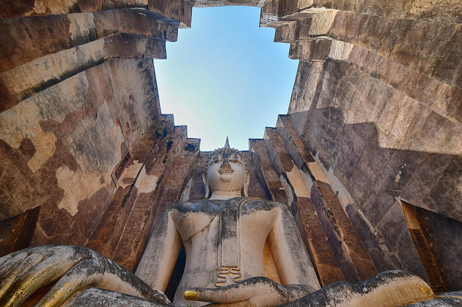 Wat Si Chum : the big Sukhothai Budhha in the historical site of Sukhothai, Thailand Photograph by Yanis Ourabah
