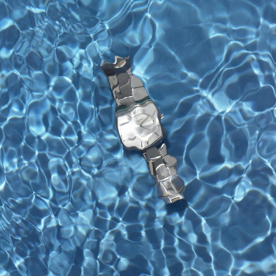 Watch in swimming pool Photograph by Siri Stafford