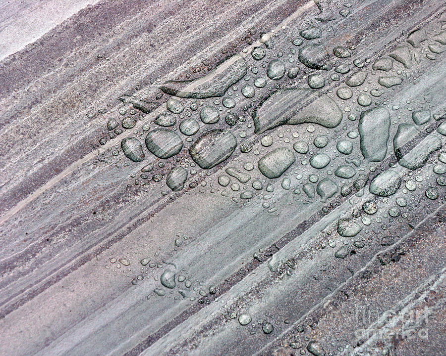 Water drops on slate Photograph by Robert Douglas