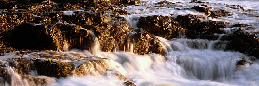 Water flowing through rocks, Playa Los Cerritos, Todos Santos, Baja California Sur, Mexico Photograph by Panoramic Images
