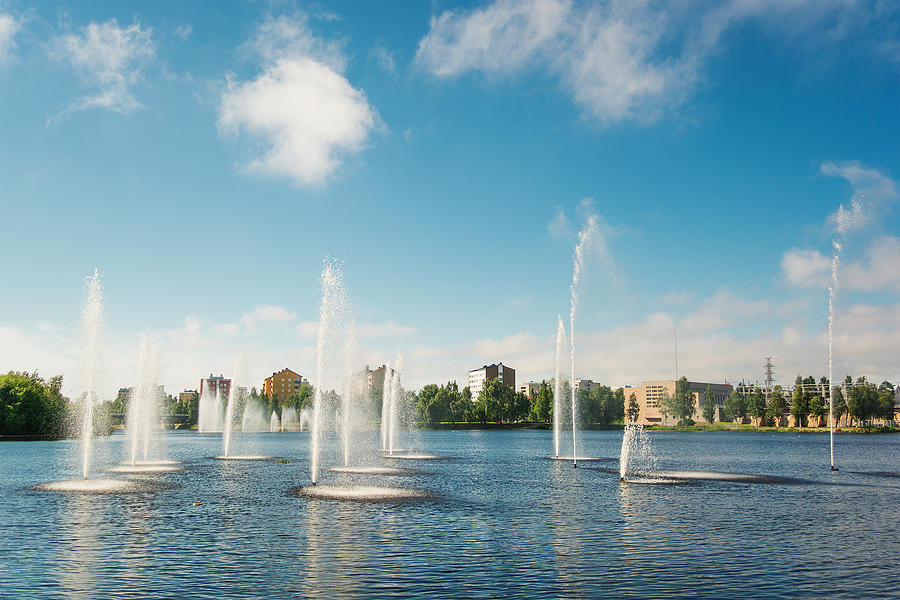 Water fountains in lake, Oulu, Finland Photograph by SilvanBachmann