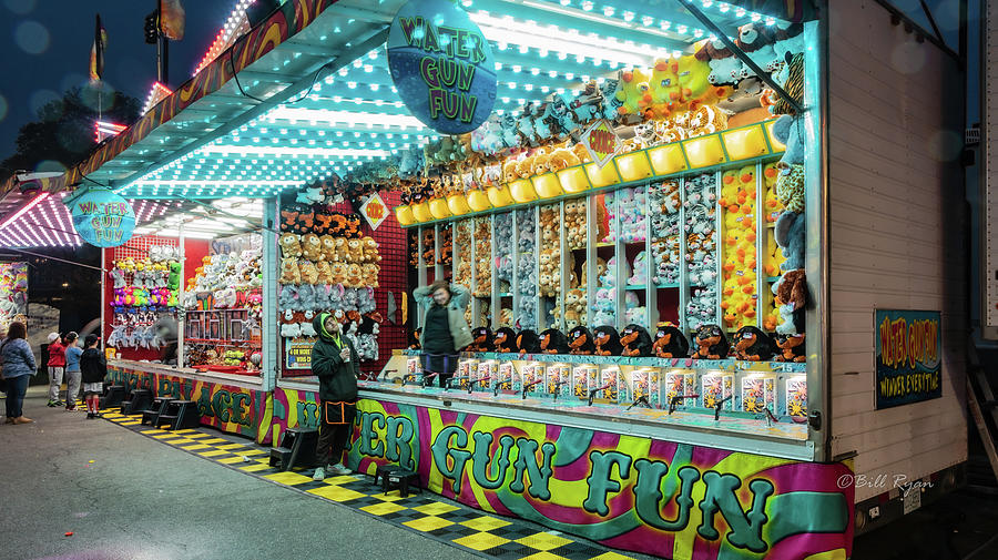 Water gun fun Photograph by Bill Ryan - Fine Art America