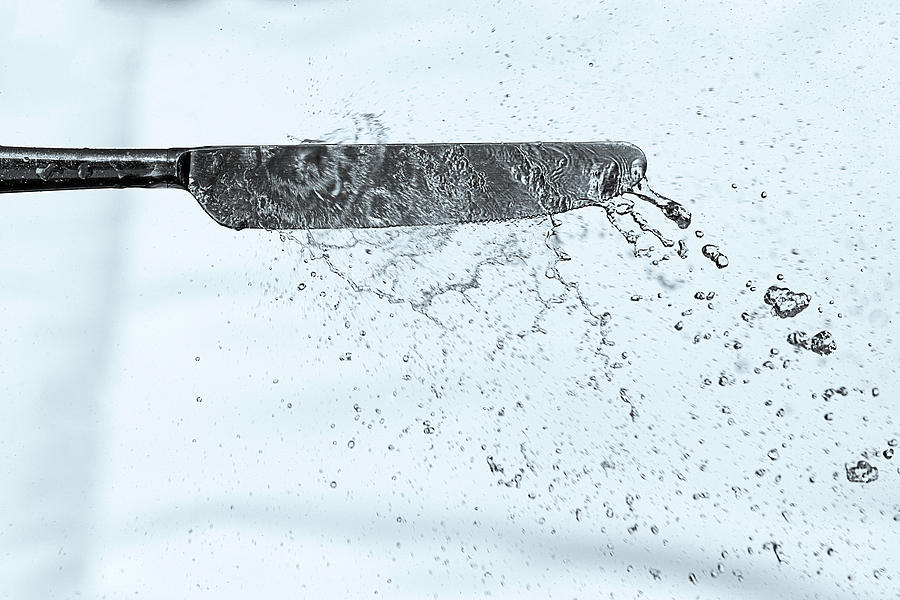 Water Knife Photograph by Wolfgang Stocker