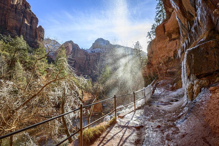 Waterfall falls from overhanging rock, icy hiking trail Emerald Pools Trail in Winter, Virgin River, Zion National Park, Utah, USA Photograph by imageBROKER/Valentin Wolf
