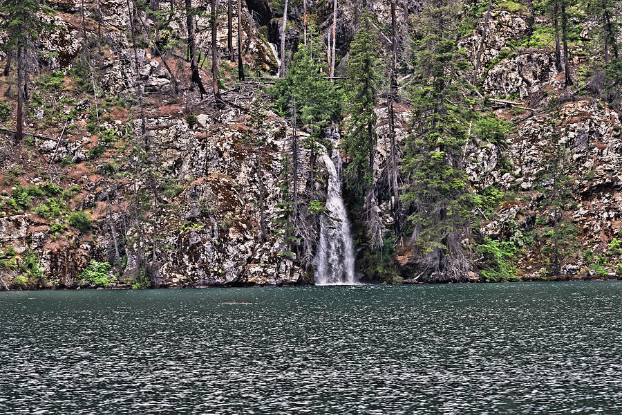 Waterfall tumbling into Lake Chelan Photograph by Jeff Swan