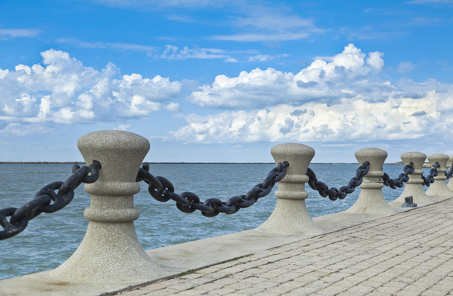 Waterfront Pilings, Chains and Brick Walkway along Lake Erie Photograph by Drnadig