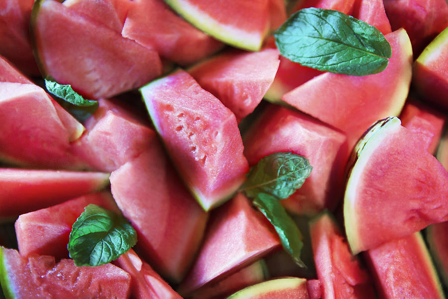 Watermelon pieces salad and mint leaves from above Photograph by Nicki Drab