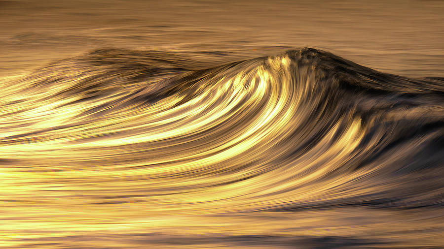 Wave at sunset Photograph by Mikel Martinez de Osaba