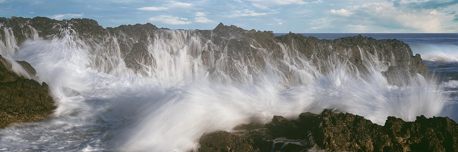 Waves breaking over a seastack at Playa Los Cerritos, Cerritos, Baja California Sur, Mexico Photograph by Panoramic Images
