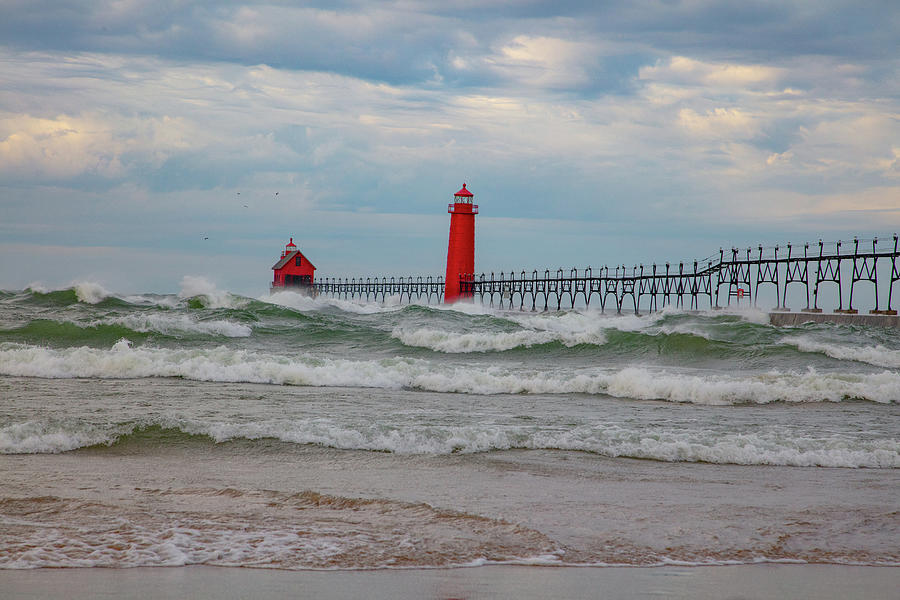 Waves crashing at Grand Haven Pier in Michigan Photograph by Eldon McGraw