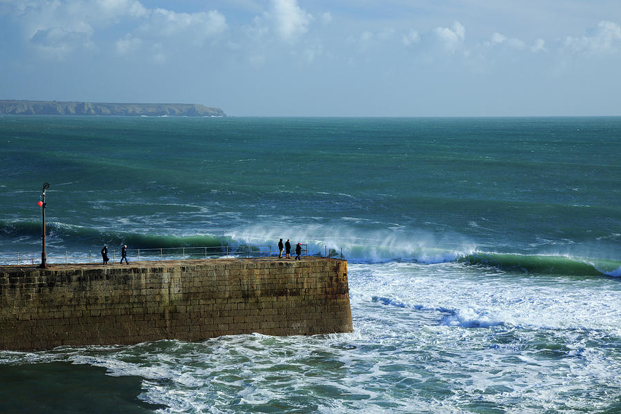Waves crashing at Porthleven Beach Photograph by Ian Middleton