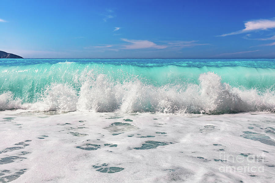 Waves crashing Ionian sea in Greece. Photograph by Michal Bednarek