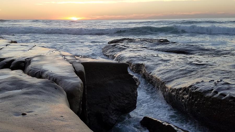 Waves on rocks at sunset Photograph by Shabnam Mozafari / FOAP