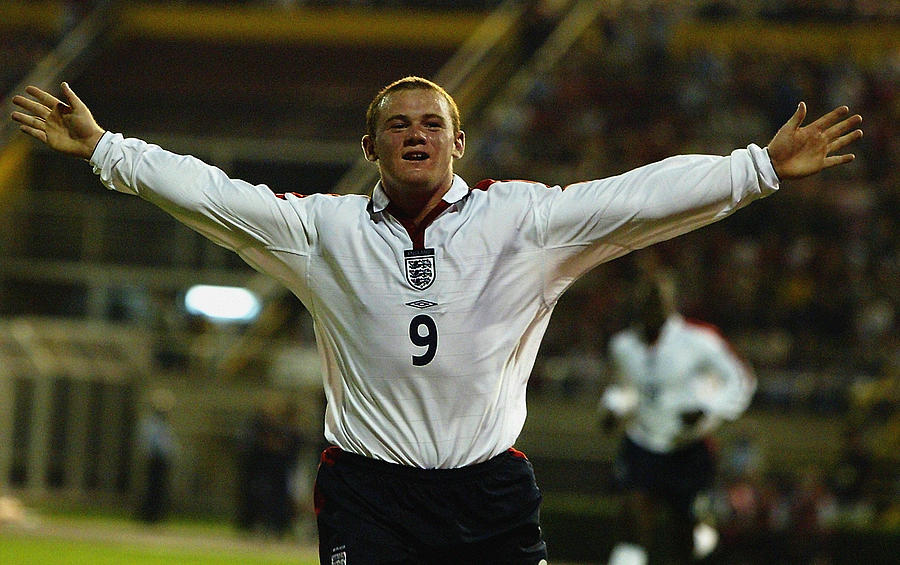 Wayne Rooney of England celebrates scoring and becoming Englands youngest ever goal scorer Photograph by Jamie McDonald