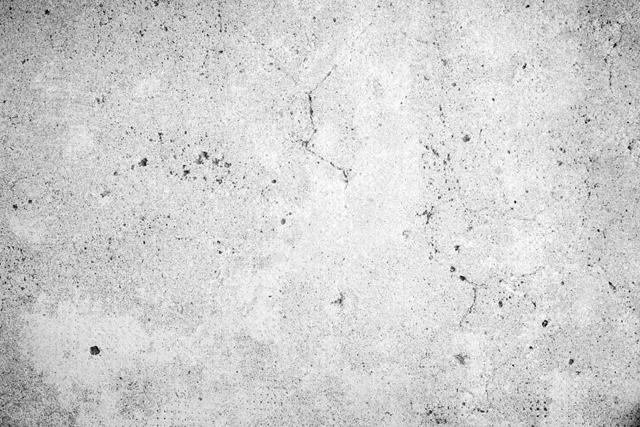 Weathered and aged concrete wall texture background in black and white with vignette Photograph by Tuomas Lehtinen
