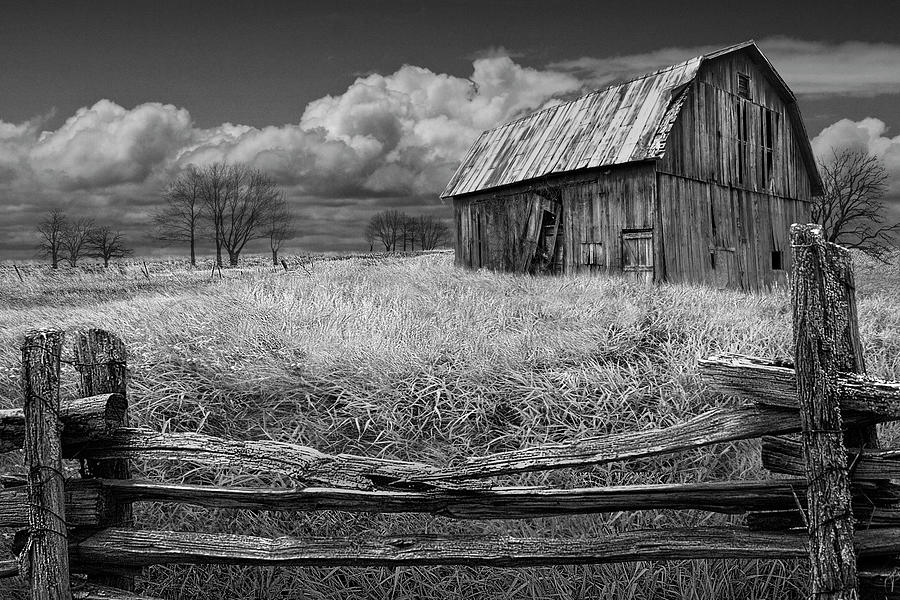 Weathered Barn In Black And White With Wooden Rail Fence Photograph