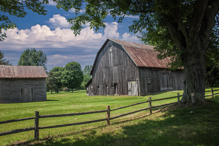 Weathered Barn with Wooden Fence Photograph by Randall Nyhof