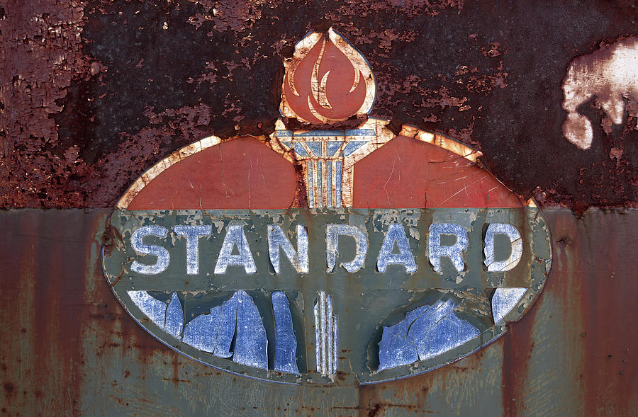 Weathered Standard Oil Logo on abandoned gas pump in Kief ND Photograph by Peter Herman