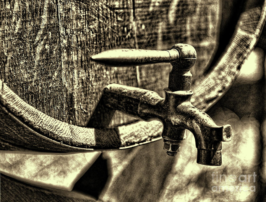 Weathered tap and barrel in sepia Photograph by Paul Ward