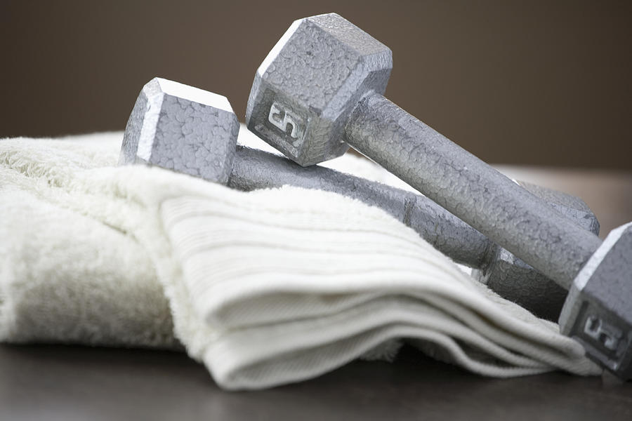 Weights and towels Photograph by Tammy Hanratty