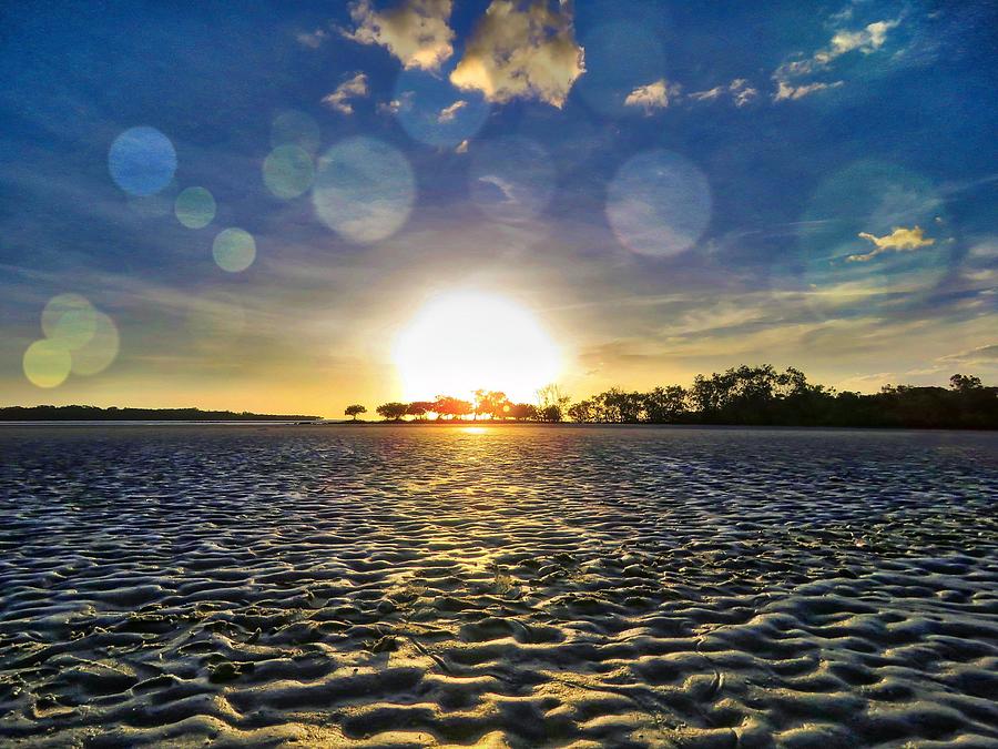 Weipa Beach Setting Sun On Patterns In The Sand Photograph by Joan Stratton