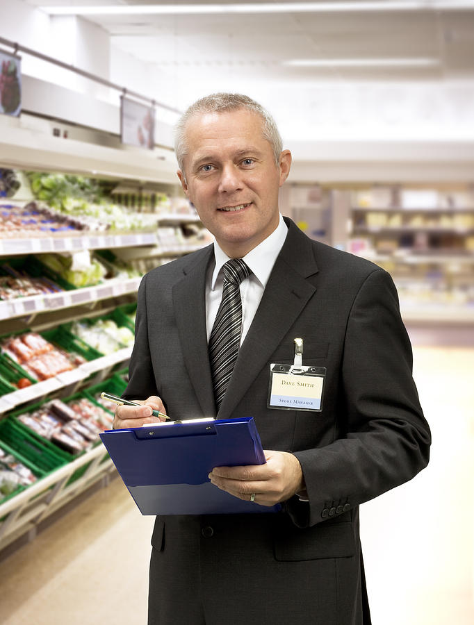 Welcoming supermarket manager Photograph by Anthony Bradshaw