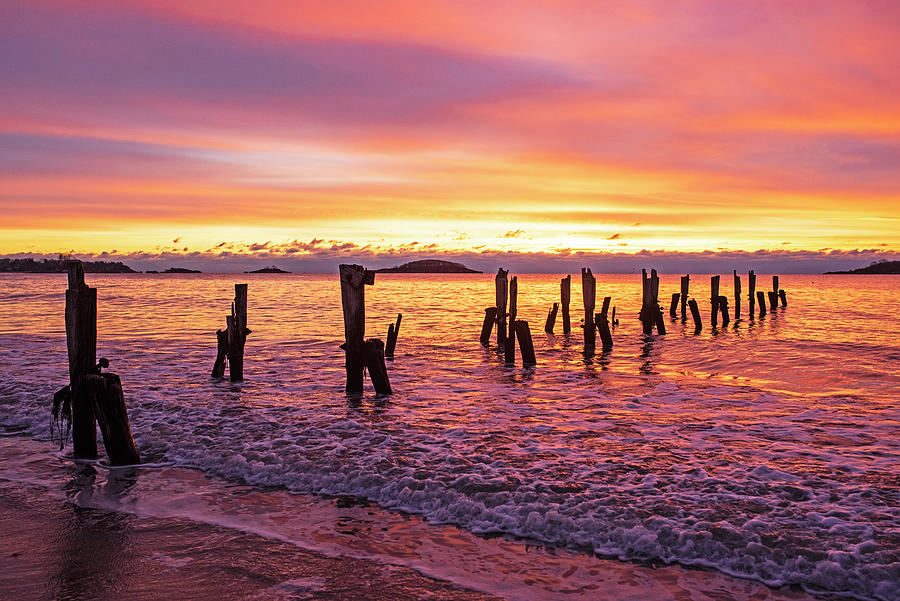 West Beach Vibrant Sunrise over the Pilings Beverly Massachusetts Morning Photograph by Toby McGuire