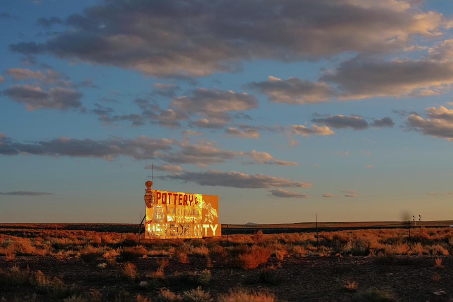 Western Sunset Shining on Abandoned Sign Photograph by Matthew Bamberg