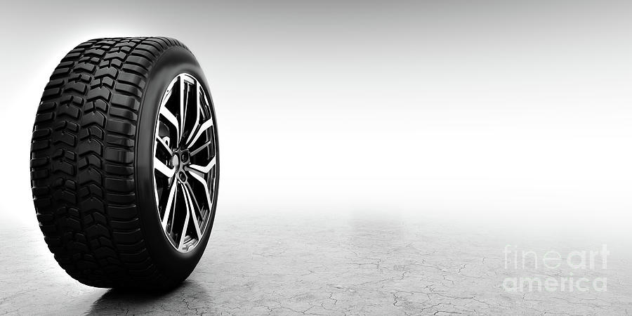Wheel with modern alu rim on white background Photograph by Michal Bednarek