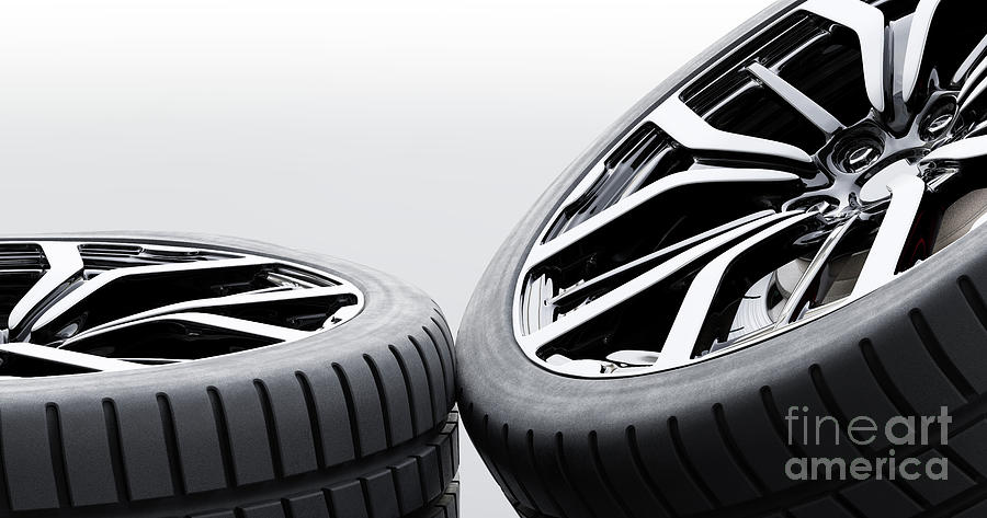 Wheels with modern alu rims on white background Photograph by Michal Bednarek