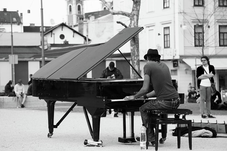 When he plays piano in the park Photograph by Ian Middleton