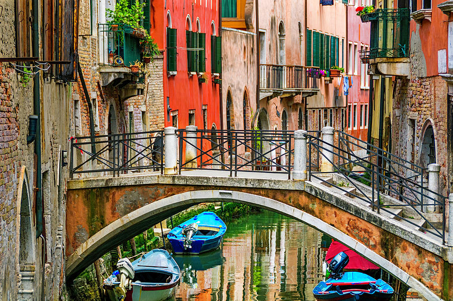 venice Canal bridge and boats Photograph by Xavier Cardell
