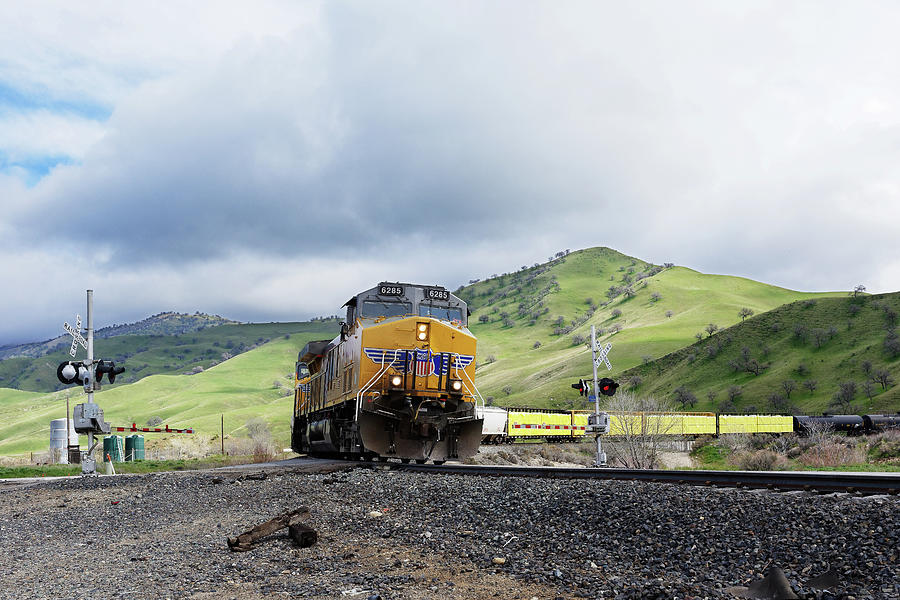 Where Steel Wheels Meet the Road -- Freight Train on a Grade Crossing in Caliente, California Photograph by Darin Volpe