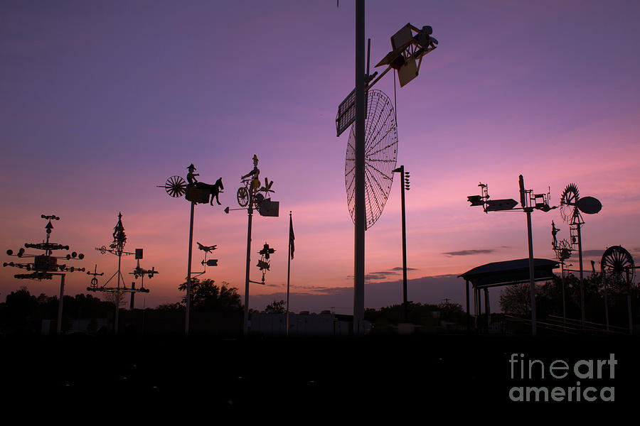 Whirligigs on sunset Photograph by Darrell Foster