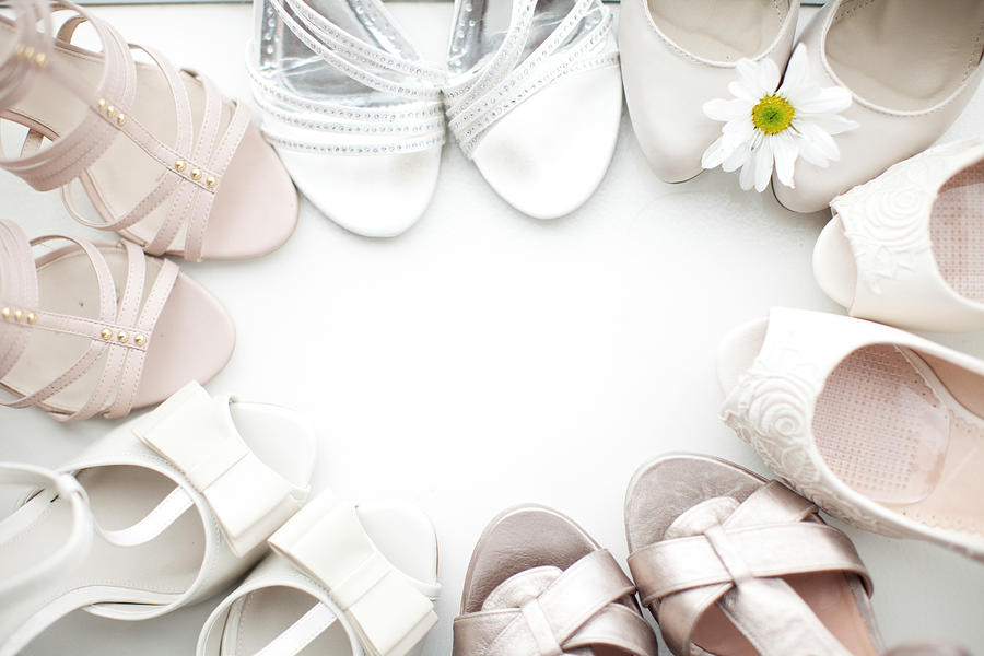 White bridesmaid and wedding shoes in a circle Photograph by Wander Women Collective