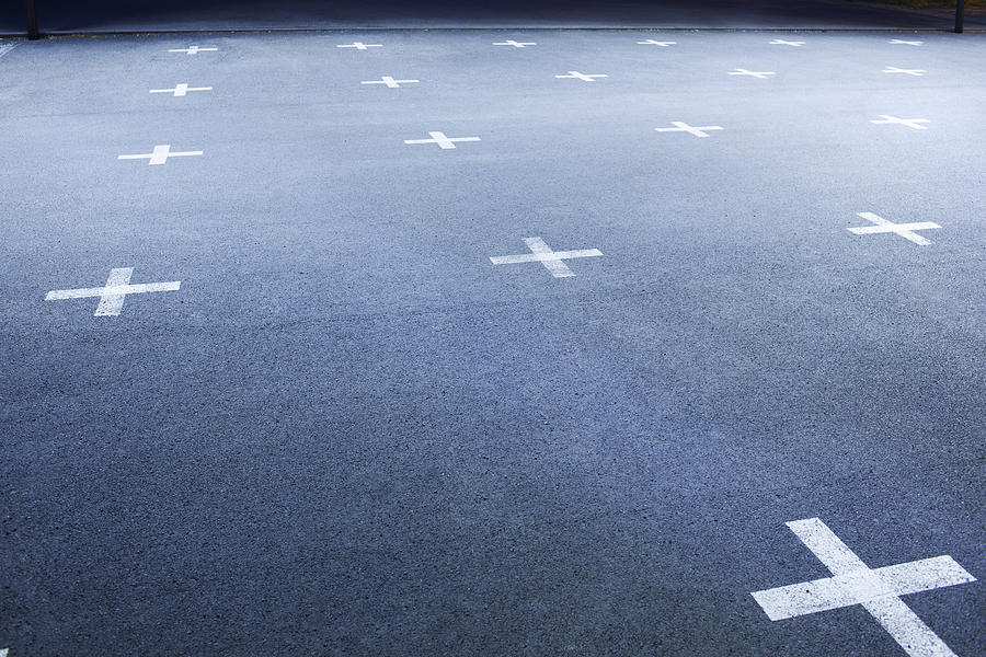 White Crosses on concrete floor Photograph by Silvia Otte