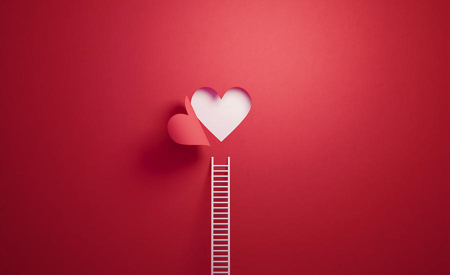 White Ladder Leaning on Red Wall with Cut Out Heart Shape Photograph by MicroStockHub