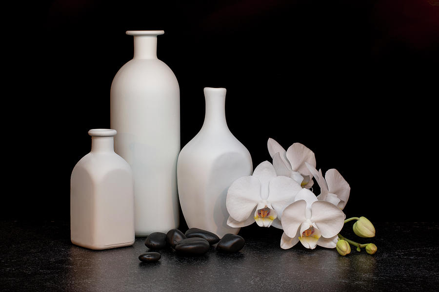 White Orchid and Bottles Photograph by Tom Mc Nemar