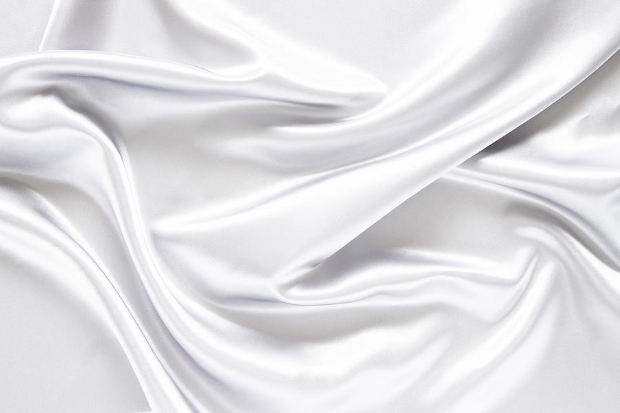 White satin textured background material Photograph by Katsumi Murouchi
