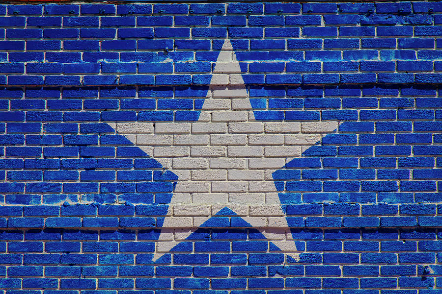 White Star On Blue brick Wall Photograph by Garry Gay
