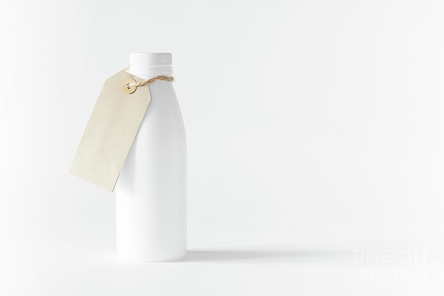 White trash recycled bottle Photograph by Simon Bratt
