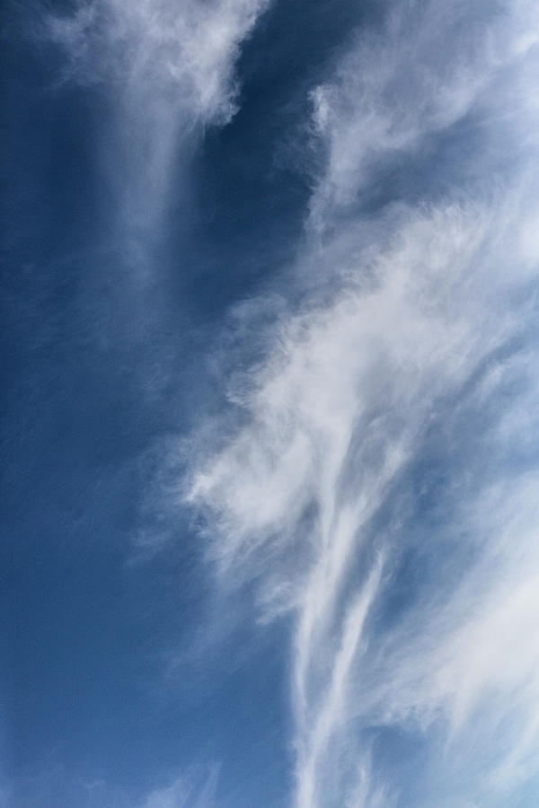 White Wisps in Blue Cloudscape Photograph by Debra and Dave Vanderlaan