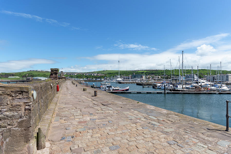 Whitehaven harbour wall Photograph by Steev Stamford