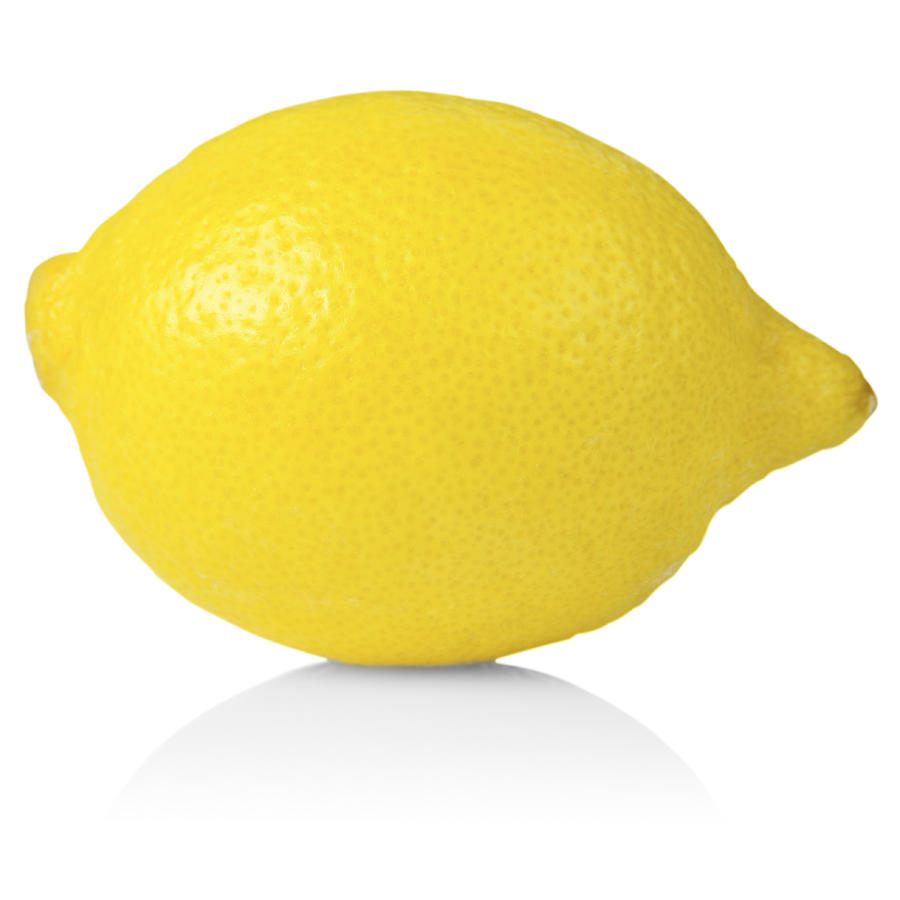 Whole lemon Photograph by Creative Crop